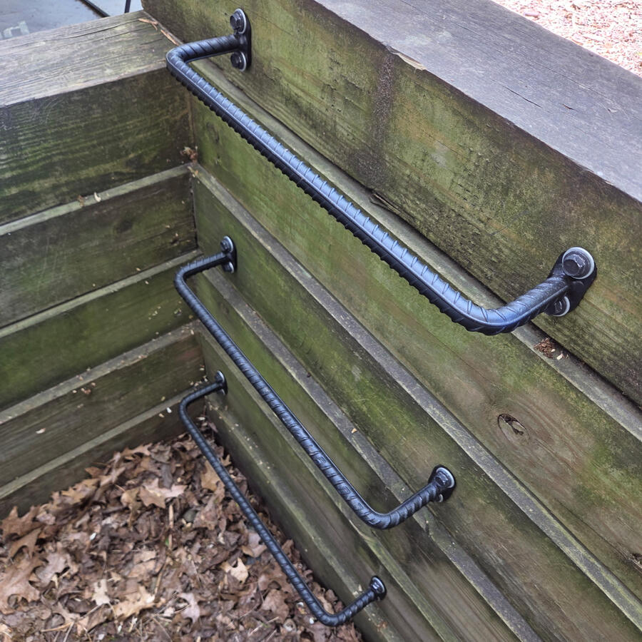 Secure ladder rungs installed to improve window well access and emergency exit safety.